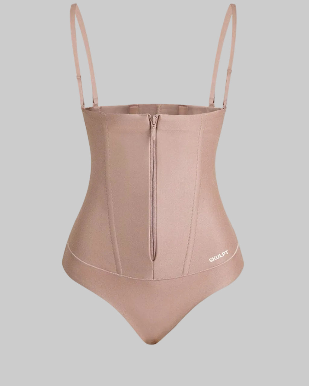 Beige shapewear bodysuit with thin straps on a white background