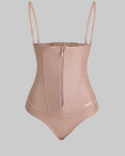 Beige shapewear bodysuit with thin straps on a white background