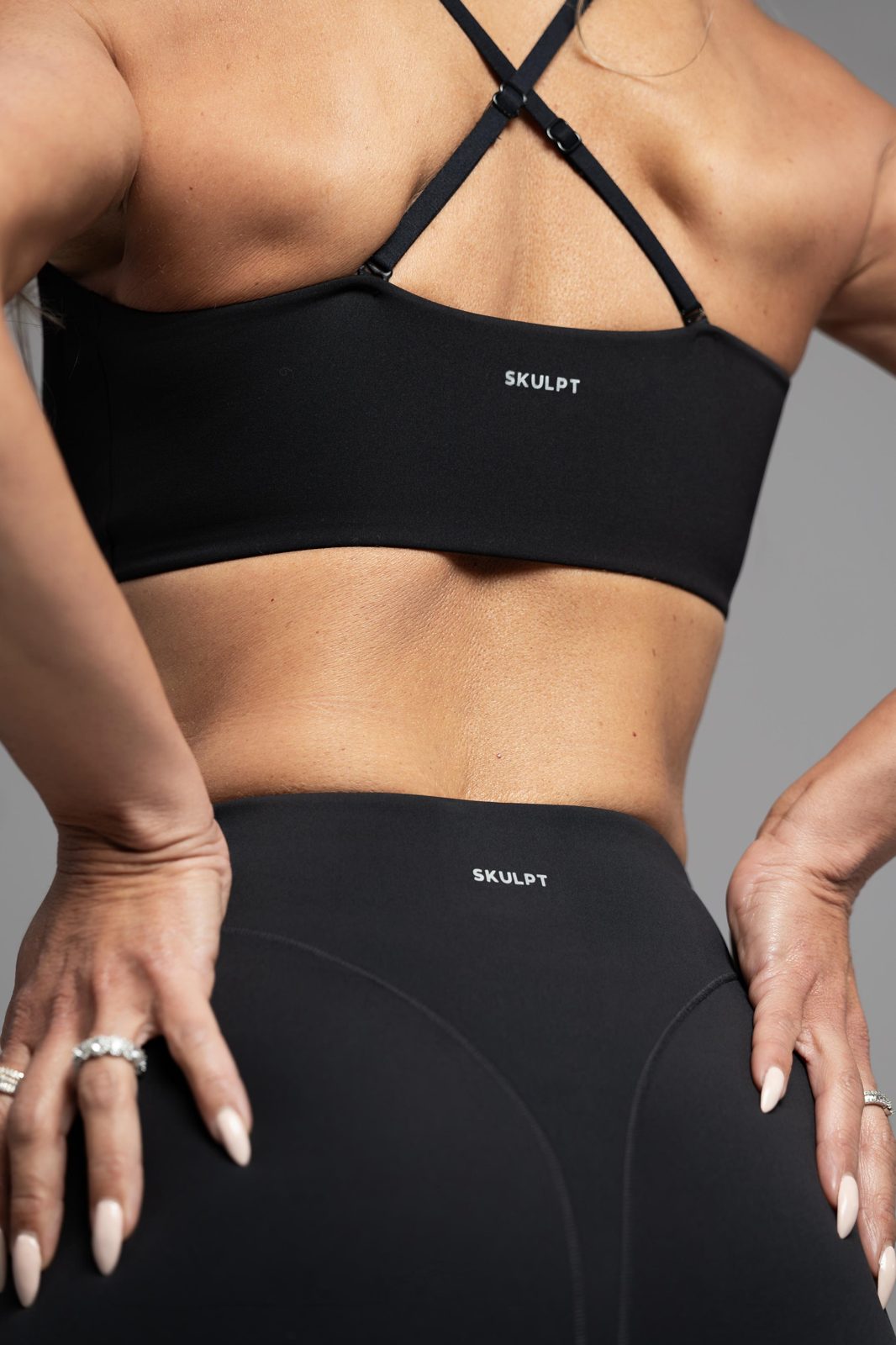Close-up of SKULPT skulpting bra and leggings fabric and waistband detail – fabric and fit detail, SKULPT